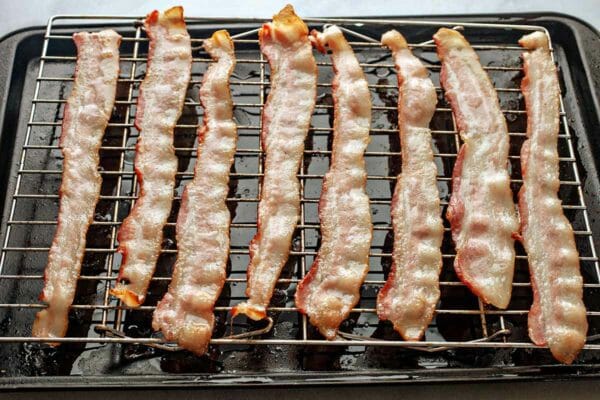 How To Bake Bacon - partially cooked bacon on rack