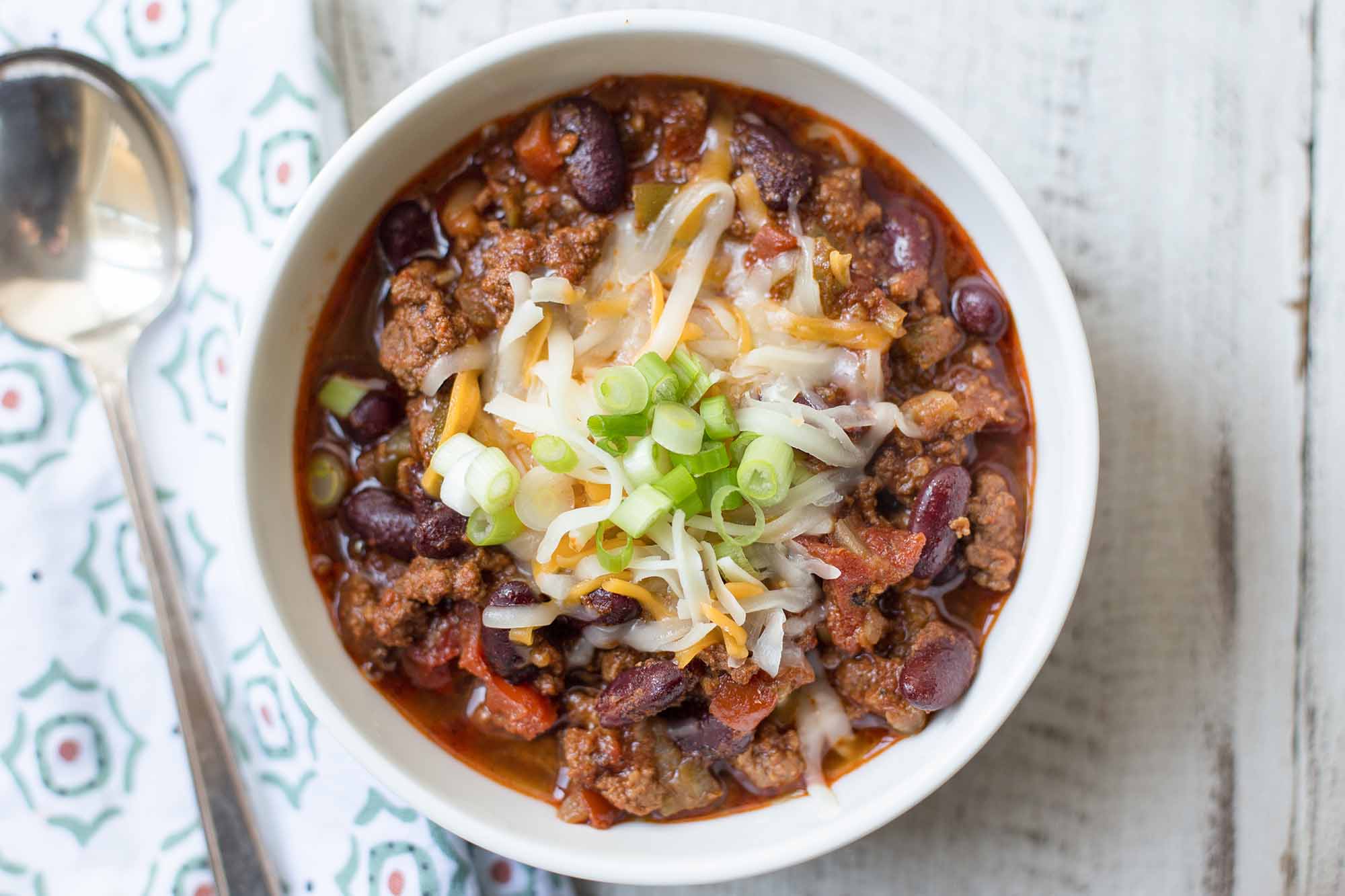instant pot chili recipe in single bowl with spoon