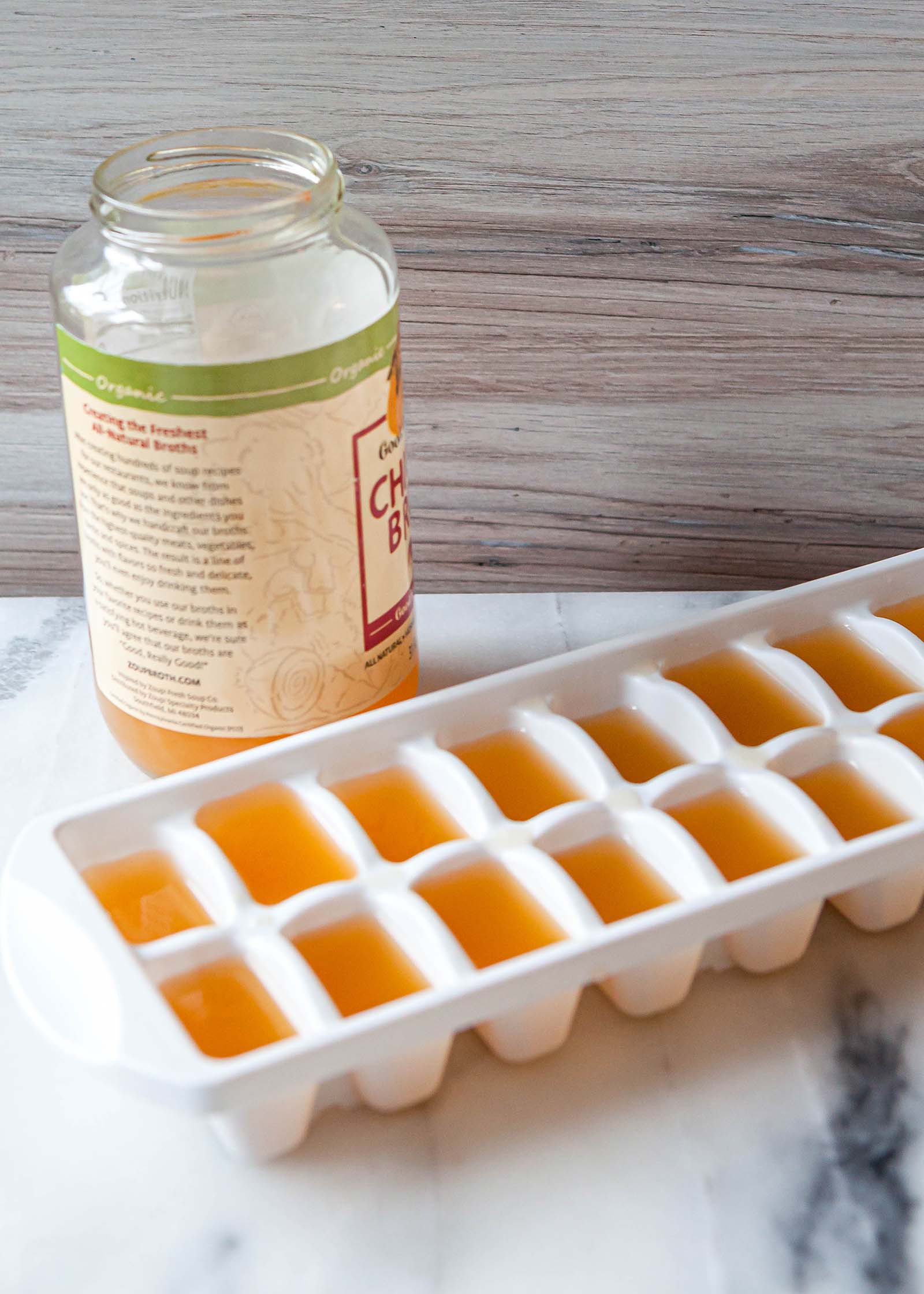 Chicken broth in ice cube tray