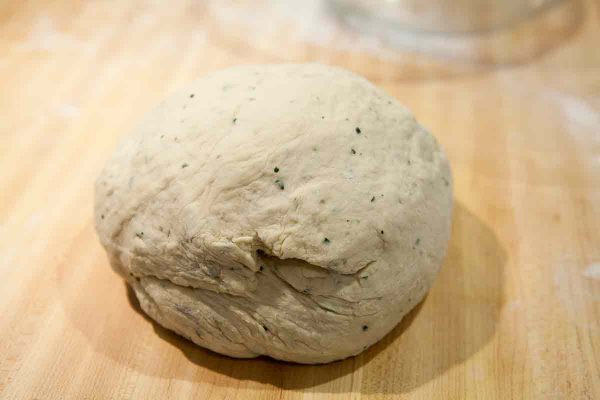 A ball of dough for focaccia bread, smooth and ready for the first rise