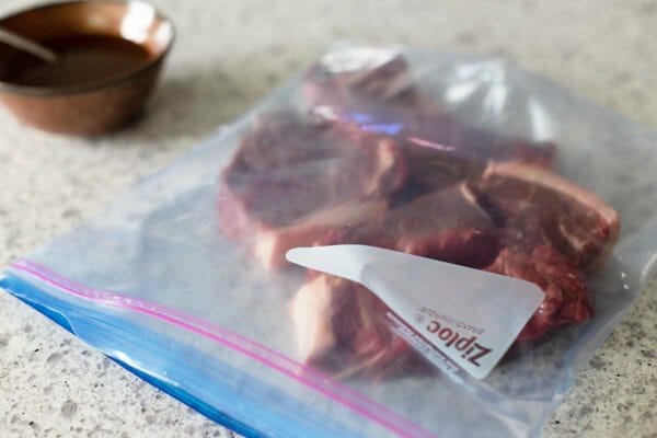 Steak in a ziplock bag to show how to broil steaks.