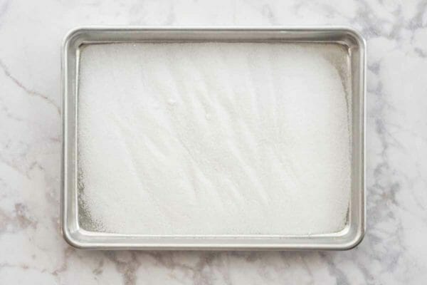 Authentic Tres Leches Cake Recipe coat pan with sugar