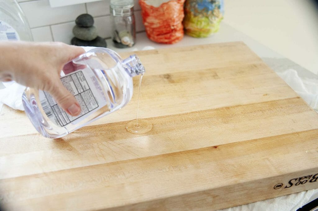 Pour mineral oil on a cutting board